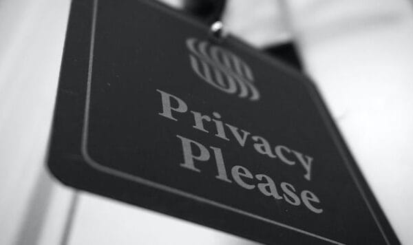 Black and white Privacy Please sign close-up representing data privacy