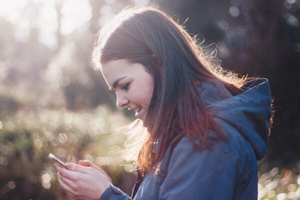 Teen taking a selfie with smartphone