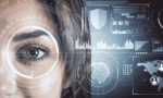 Close-up of a woman’s eye overlaid with futuristic digital displays and interfaces, depicting biometric scanning or cybersecurity technology concepts.